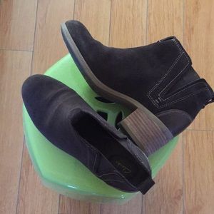 Clark’s dark brown boots .